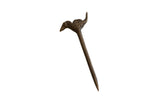 Handmade vintage African bronze bird pin with a dark, aged patina.