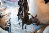 Aged bronze patina on the vintage African camel's head and bridle, with a collector's tag.