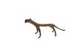 Vintage African bronze cheetah sculpture with a slender, stylized form and textured patina.