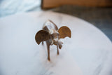 Textured trunk and wide ears of vintage African copper elephant.