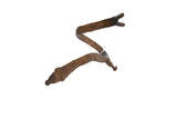 Vintage African bronze snake arm cuff with an S-shaped body and engraved rider head.