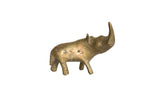 Vintage African bronze rhino sculpture with a textured golden patina.