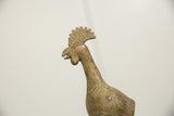 Vintage African bronze bird's textured back and neck, showing aged green patina.