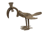 Vintage African bronze bird sculpture with a long curved neck, textured body, and aged patina.
