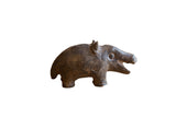 Vintage handmade African bronze hippo with a rustic, textured dark patina.