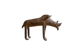 Vintage African bronze warthog sculpture with a rustic handmade texture and dark patina.