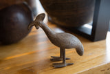 Aged patina and unique texture on the handmade African bronze bustard.