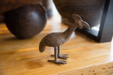 Vintage African bronze kori bustard bird sculpture with intricate etched body details.