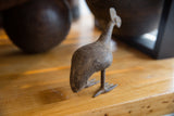 Textured back with aged patina on the vintage African bronze kori bustard bird.