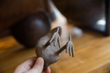Detailed bronze feet with aged patina of the vintage African kori bustard bird sculpture.