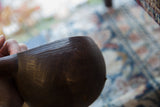 Hand-carved decorative lines and scalloped pattern on the vintage wood pitcher.