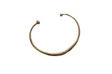 Vintage African thin bronze cuff bracelet with a rustic handmade texture and knobbed ends.