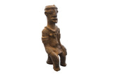 Antique African terracotta Nkisi fetish figure, handmade with earthy brown texture.