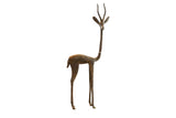 Vintage handmade African bronze alloy right facing gazelle sculpture with aged patina.
