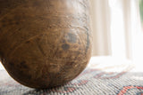 Close view of the hand-carved geometric patterns and aged patina on the vintage bowl.