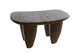Vintage African Senufo wood milk stool with a deep brown hand-carved patina.