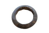 Antique Neolithic marble bracelet displaying a dark, hand-carved texture and ancient patina.