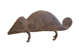 Vintage handmade African chameleon figure with a textured finish, ridged spine, and spiral tail.