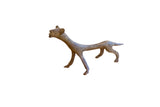 Handmade vintage African cheetah figurine with a long, stylized form and a dark, oxidized patina.