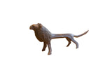 Vintage African lion collectible sculpture with a rich dark patina and handmade texture.