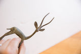 Close-up view of the vintage gazelle's head, showing its handmade oxidized texture.