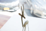 Detailed view of the African gazelle's head, showing its aged oxidized patina.