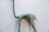 Vintage African gazelle's mid-body and legs, showing textured green-blue patina.