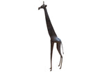 Vintage African giraffe sculpture with a tall, slender body and a dark, textured patina.