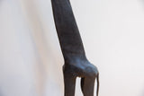 Vintage African giraffe body detail, showcasing dark wood patina and hand-carved texture.