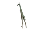 Vintage African giraffe sculpture with a slender form and brightly oxidized patina.