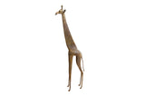 Tall vintage African giraffe collectible with a stylized, slender body and a weathered bronze finish.