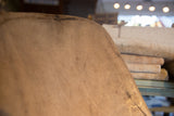 Warm patina and fine wood grain texture on the vintage carved wooden chair.