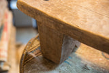 Detail of hand carved Senufo stool's aged wood grain and naturally distressed surface.