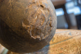 Textured surface detail of vintage African wooden bowl, highlighting its storied character and aged wood.