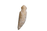 Antique Neolithic African stone weapon displaying a primitive hand-carved form and earthy texture.
