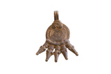 Vintage African five-headed crocodile pendant with an aged bronze finish and a central spiral motif.
