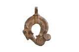 Vintage African double chameleon lizard pendant with a dark, textured metal patina.