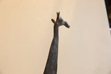 Sculpted head and horns of the large vintage African giraffe figure.