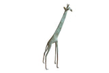 Vintage African giraffe sculpture, 1960s, with aged green and bronze patina, 12 inches tall.