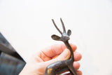 A close-up view of the vintage gazelle's head, highlighting the fine texture of its horns.