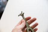 A vintage African giraffe's head showing its distinctive oxidized texture.