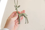 Late 1960s vintage African gazelle figurine with its green and bronze patina.