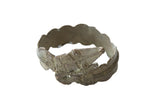 Vintage African snake cuff bracelet with detailed etched patterns and a dark patina.