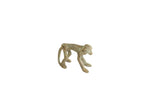 Vintage African bronze monkey figure, standing with textured green patina.