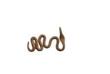 Vintage African iron snake with a coiled body and a textured, rustic patina.