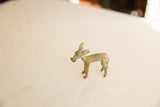Side profile of the African bronze impala highlighting its weathered, vintage patina.