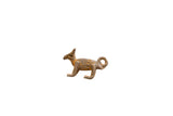 Small vintage African fox pendant, aged metal with a rust brown and orange patina.