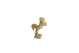 Vintage African bronze rooster figurine with a weathered green patina standing on a square base.