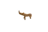 Vintage African bronze rhino figurine with a curved body and mottled, aged patina.