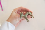 Textured vintage African Ewe impala gold weight with aged bronze patina.